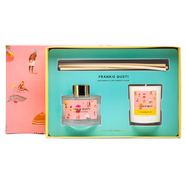Frankie Gusti diffuser and candle set in a gift box with a pink and yellow design.
