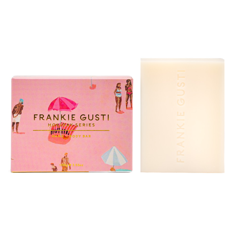 Frankie Gusti soap bar with pink packaging featuring illustrations of people and umbrellas on a white background.