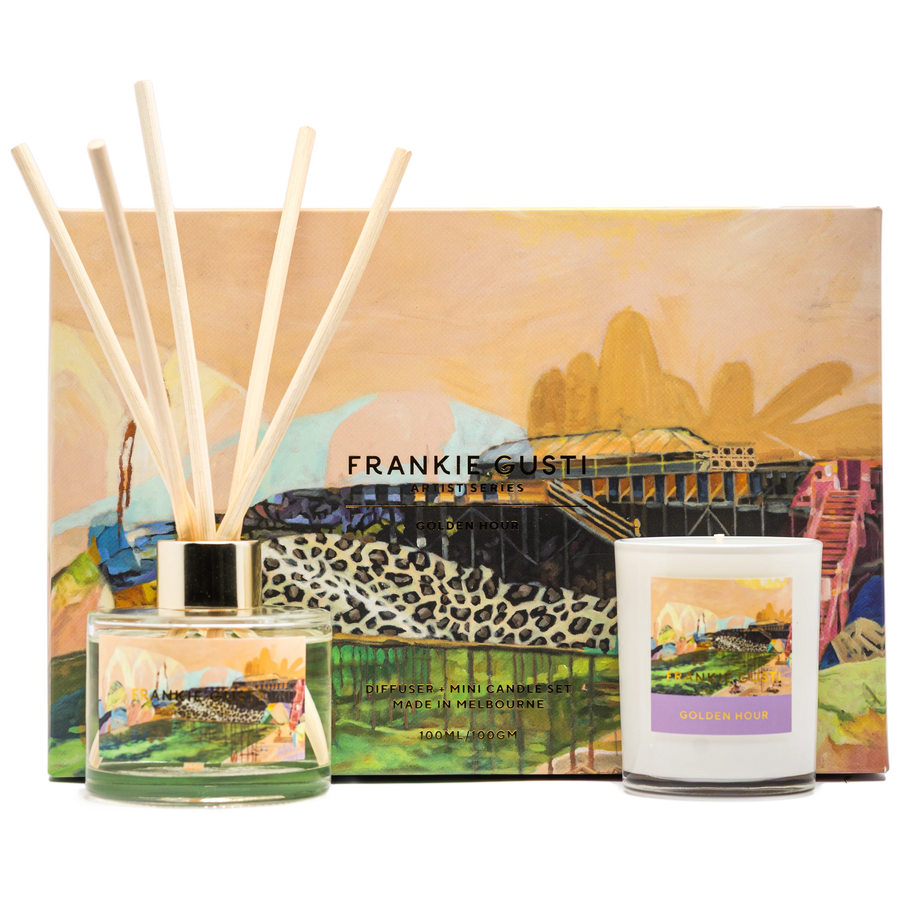 Candle and diffuser set with scenic packaging and candles on a white background