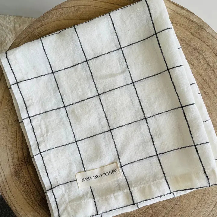 Folded checkered towel with &