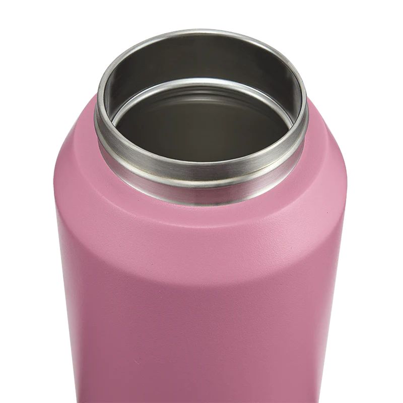Pink insulated bottle with silver interior on a white background