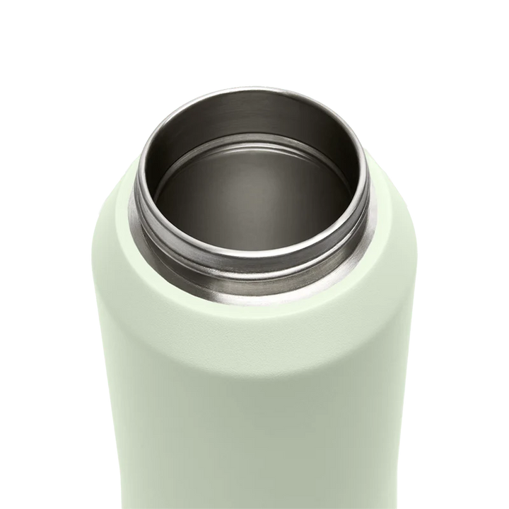 White thermos with silver interior on a white background