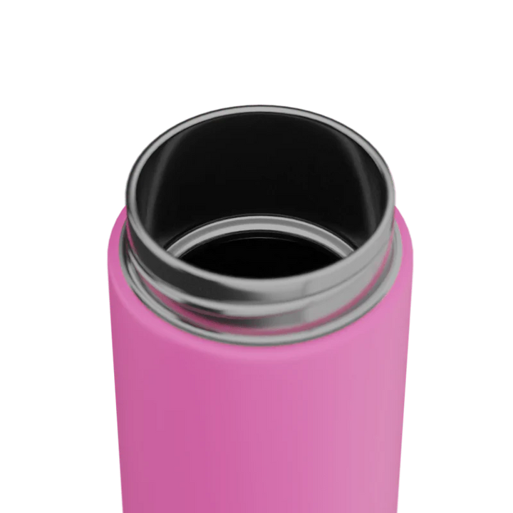 Pink thermos with silver lid on a white background