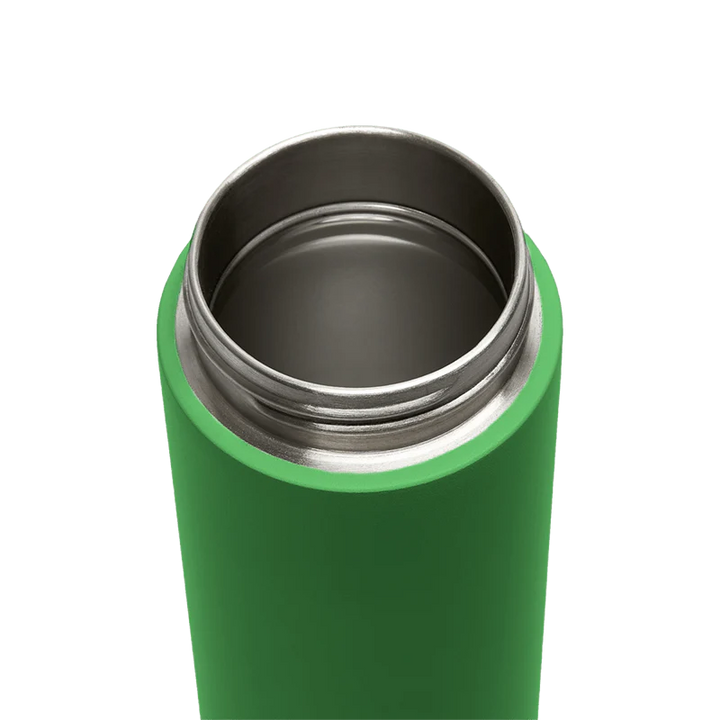 Green insulated bottle with silver lid on a white background