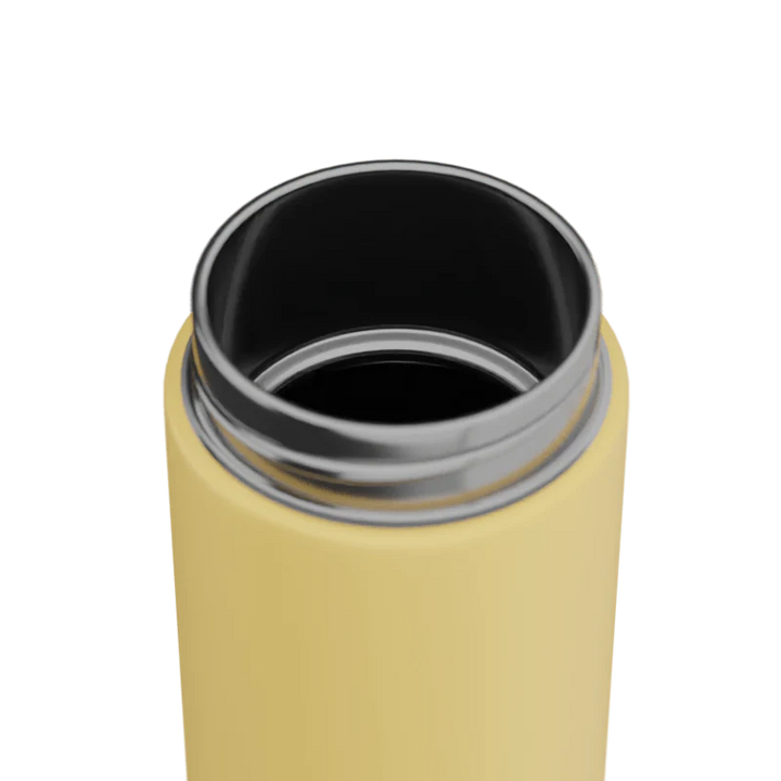 Yellow thermos with black interior on a white background