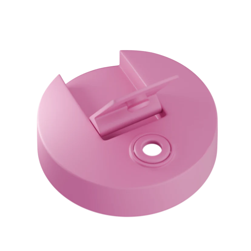 Pink plastic lid on a white background
