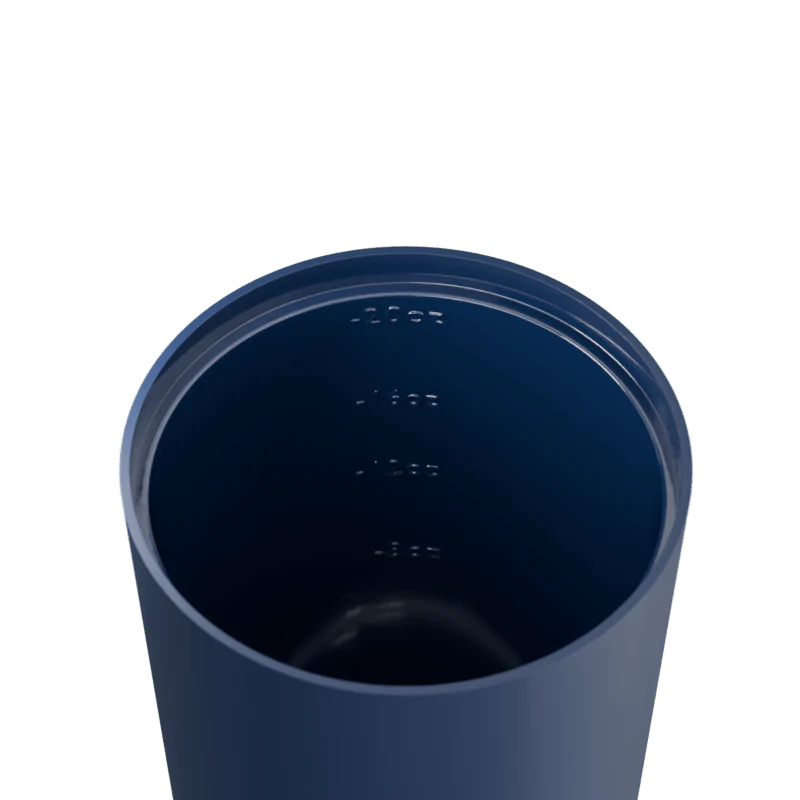 Navy blue tumbler with measurement markings on a white background