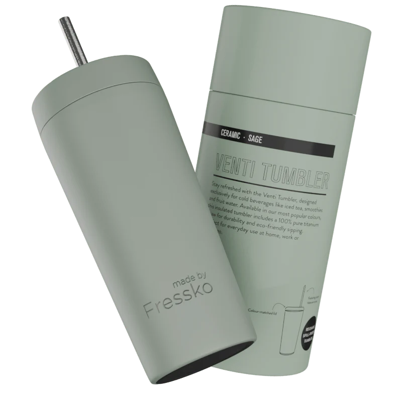 Sage green tumbler with straw and packaging on a white background