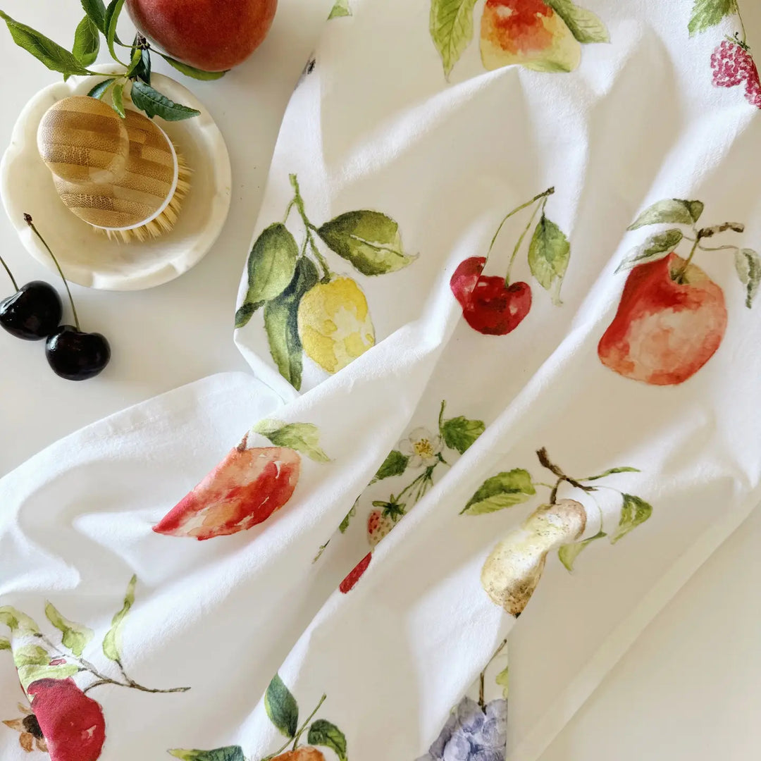 White fabric with fruit pattern on a white background