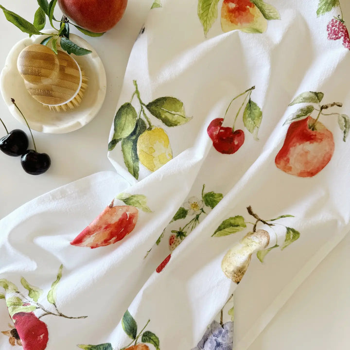 White fabric with fruit pattern on a white background