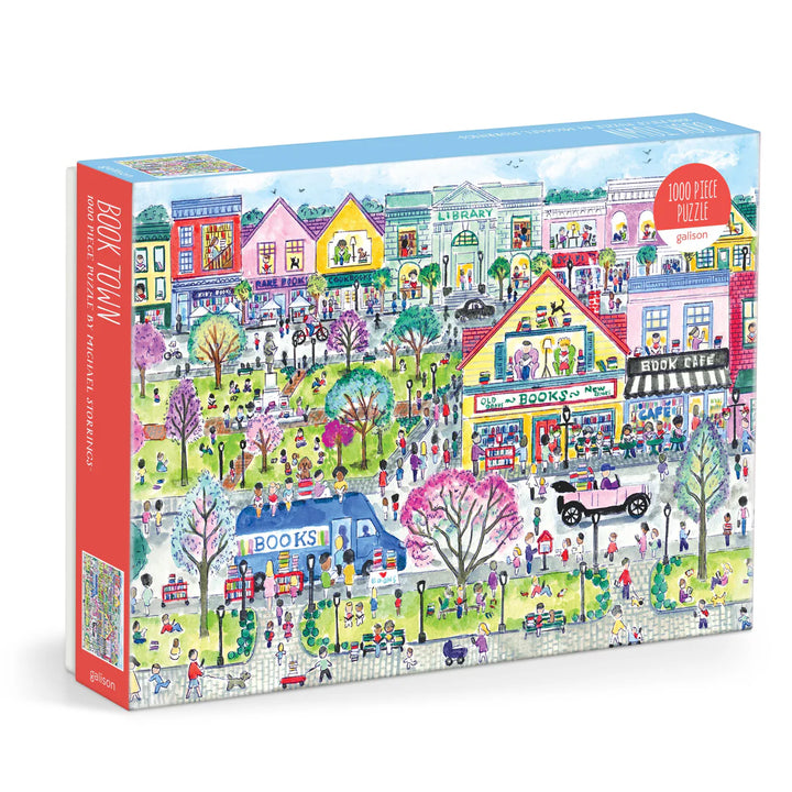 Jigsaw puzzle box with a colorful illustration of a town square scene.