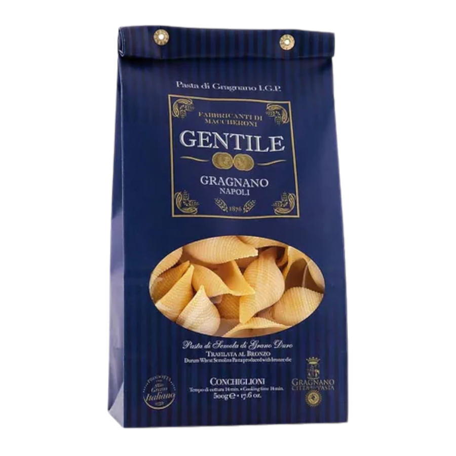 A bag of dried Gentile Conchiglioni pasta on a white background