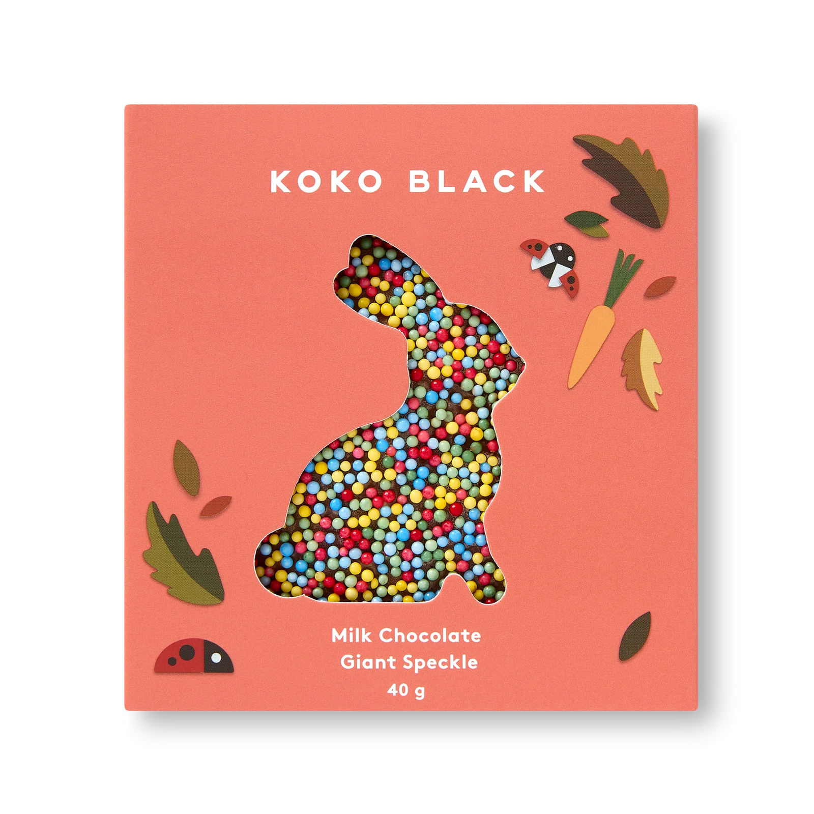 Koko Black milk chocolate giant speckle bunny packaging on a pink background