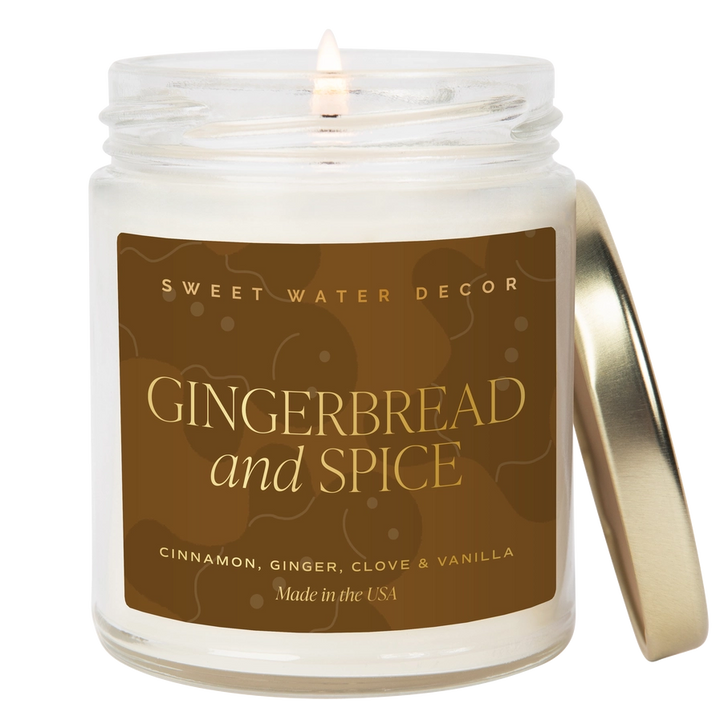 Candle in a jar labeled 'Gingerbread and Spice' by Sweet Water Decor on a white background