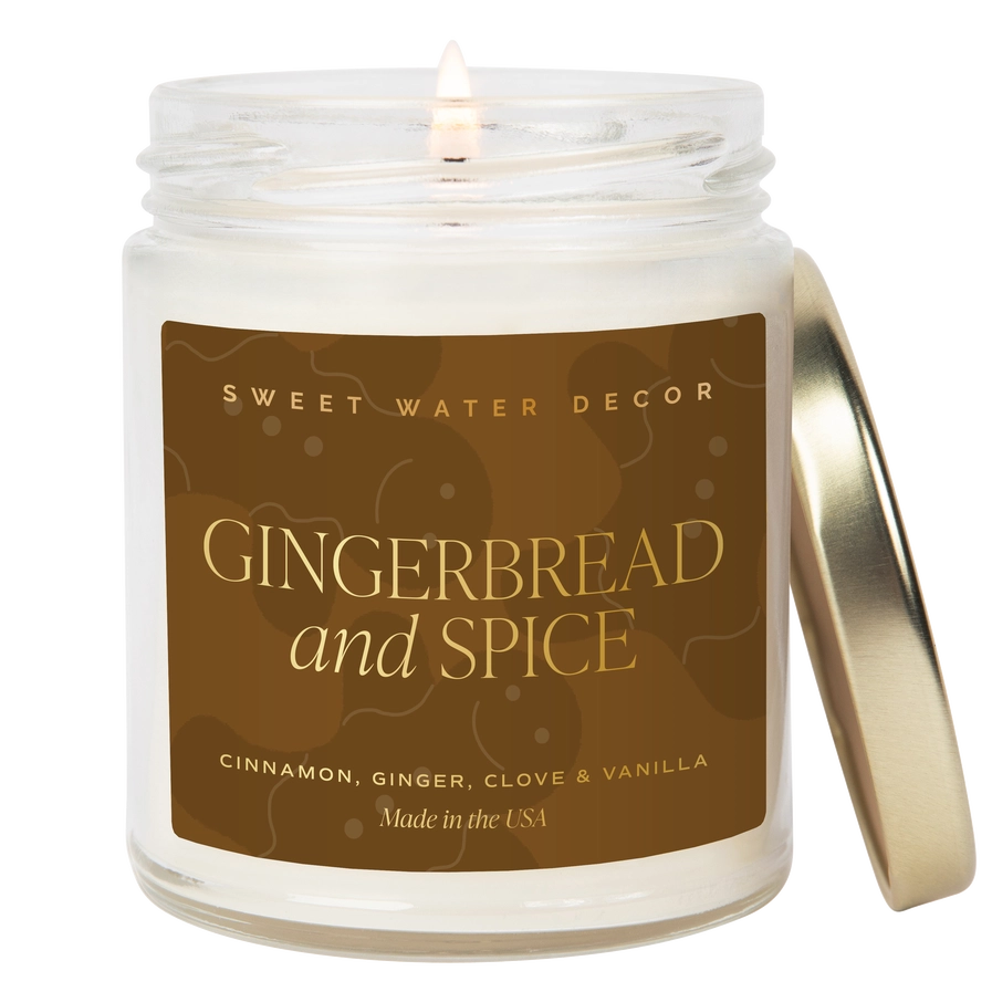 Candle in a jar labeled 'Gingerbread and Spice' by Sweet Water Decor on a white background