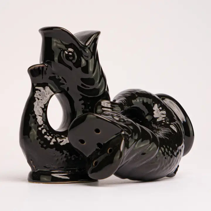 Black salt and pepper shakers in the shape of fish