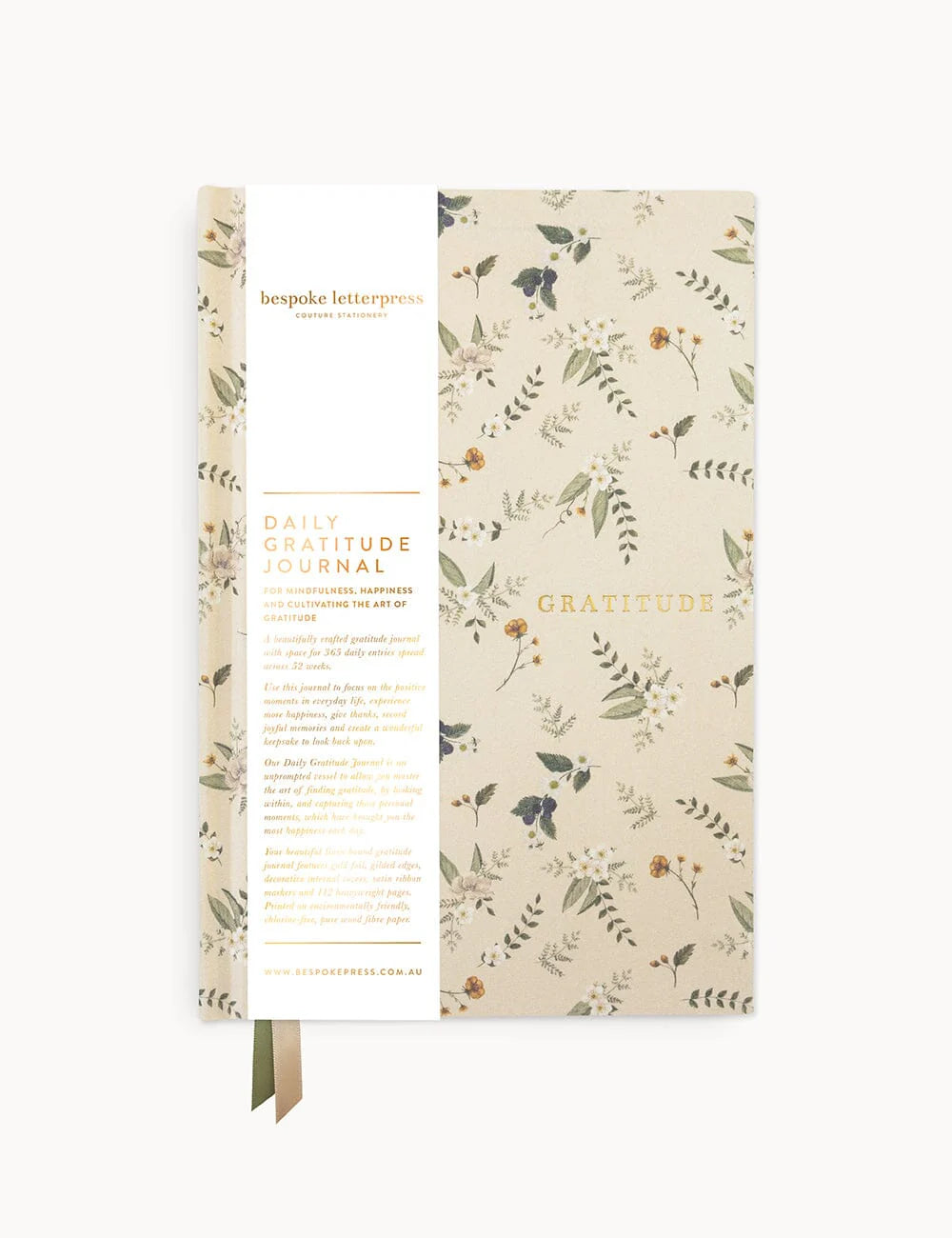Gratitude journal with floral design on a white background