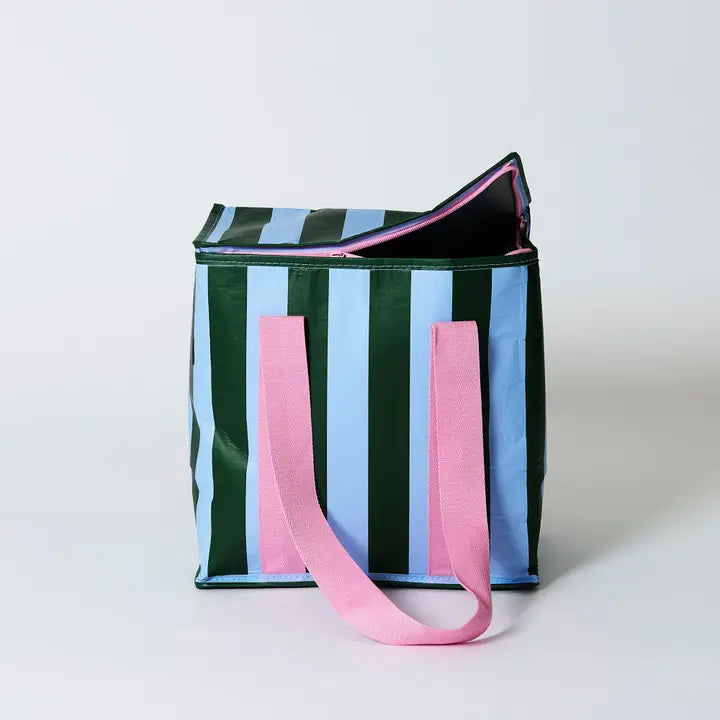 Striped tote bag with green, blue, and pink colors on a light gray background