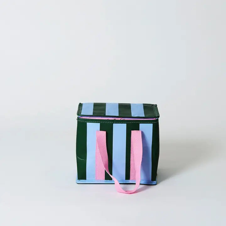 Striped cooler bag with pink handles on a light gray background