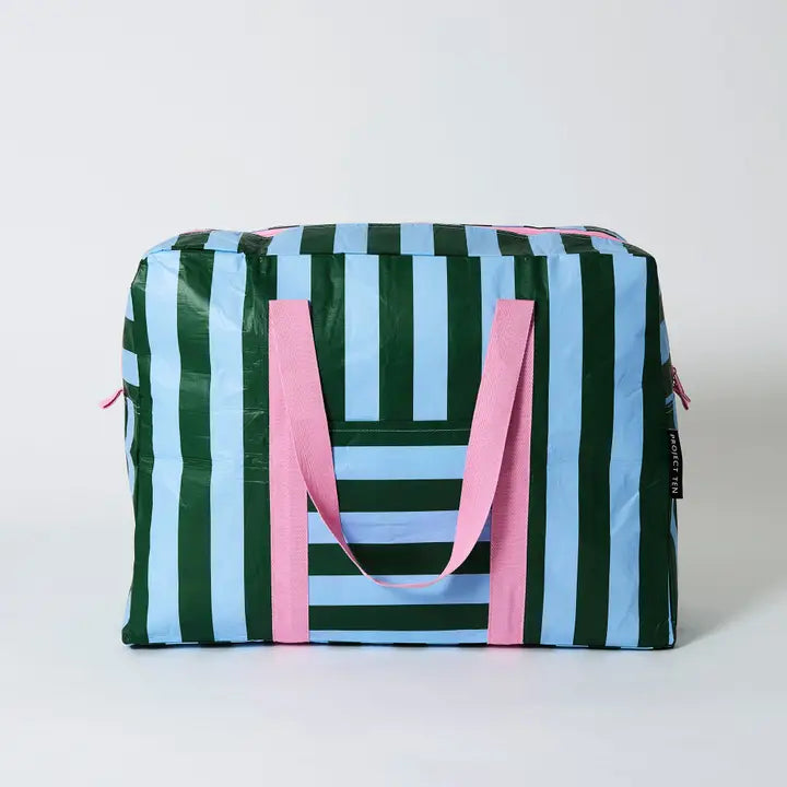 Striped bag with green, blue, and pink colors on a white background