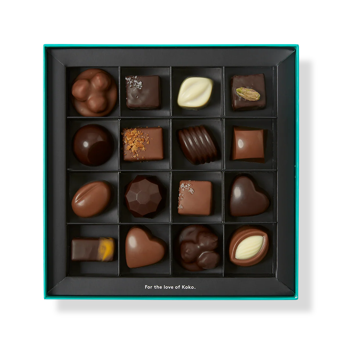 Assorted chocolates in a black box with a white background
