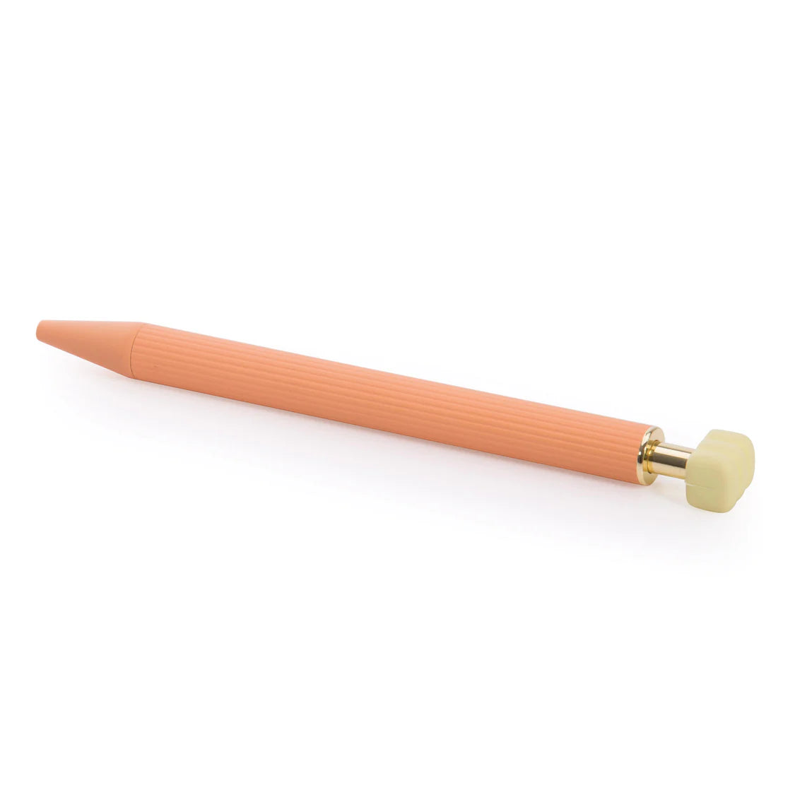 Peach-colored pen with gold clip on a white background