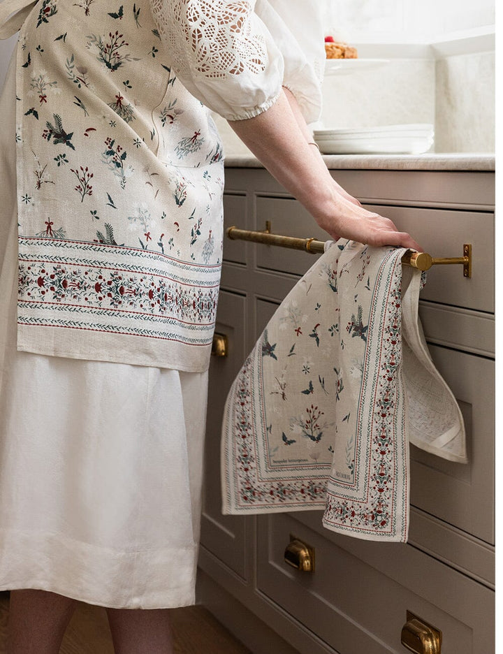 Christmas tea towel hanging over a kitchen handle