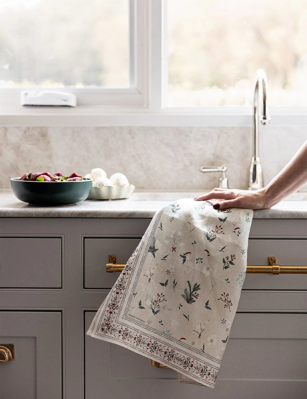 Christmas tea towel on a kitchen bench