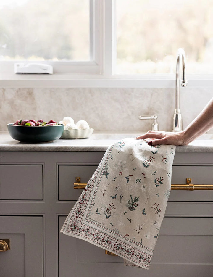 Christmas tea towel on a kitchen bench