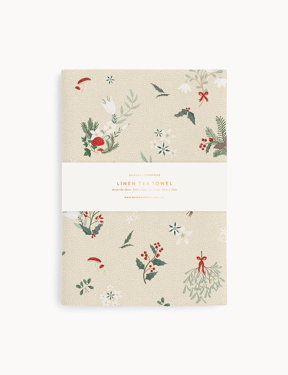 A christmas theme linen tea towel on a white background