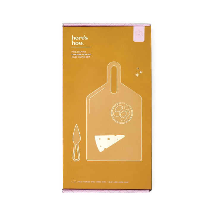 Box of a Timber cheese board with a gold cheese knife on a white background