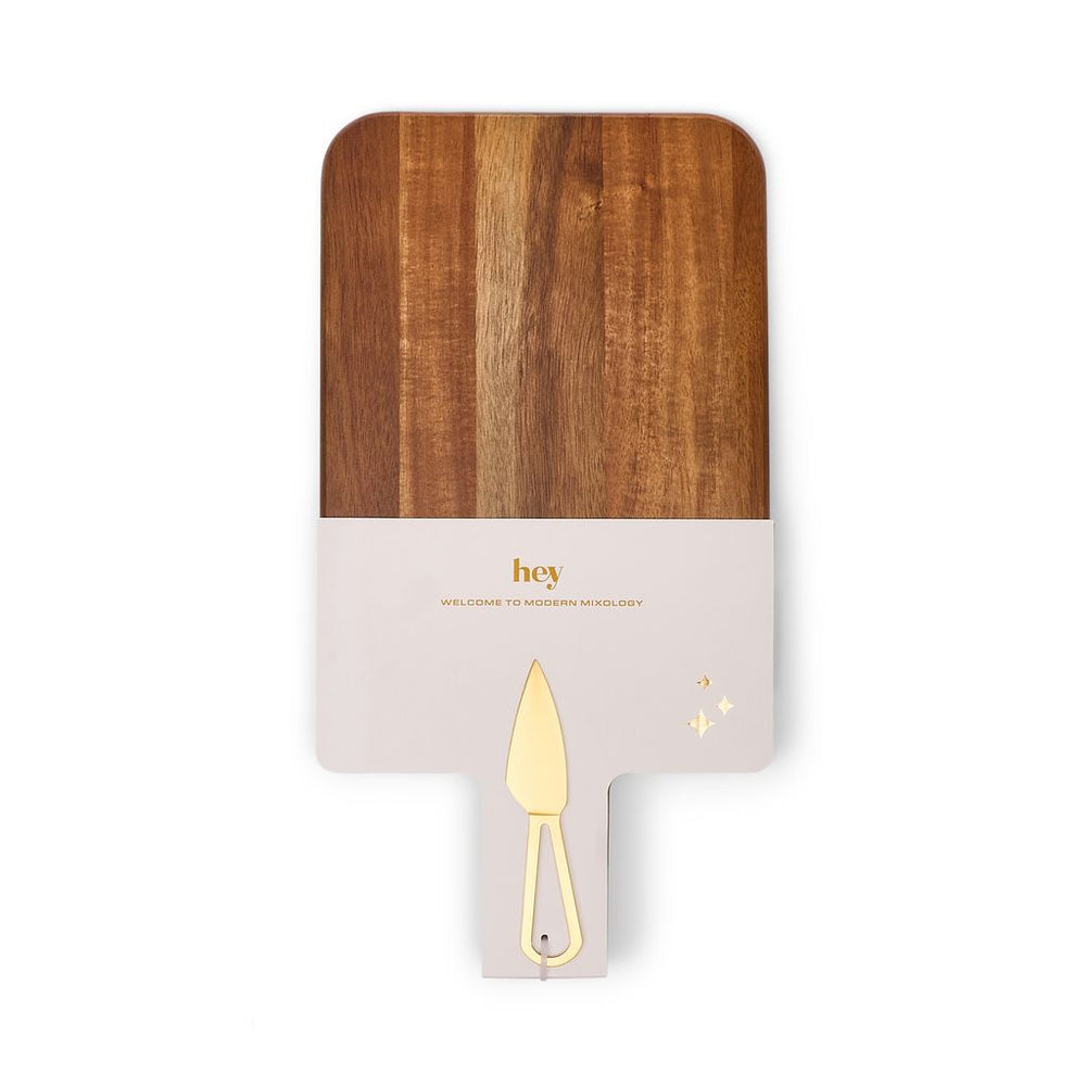 Timber cheese board with a gold cheese knife on a white background