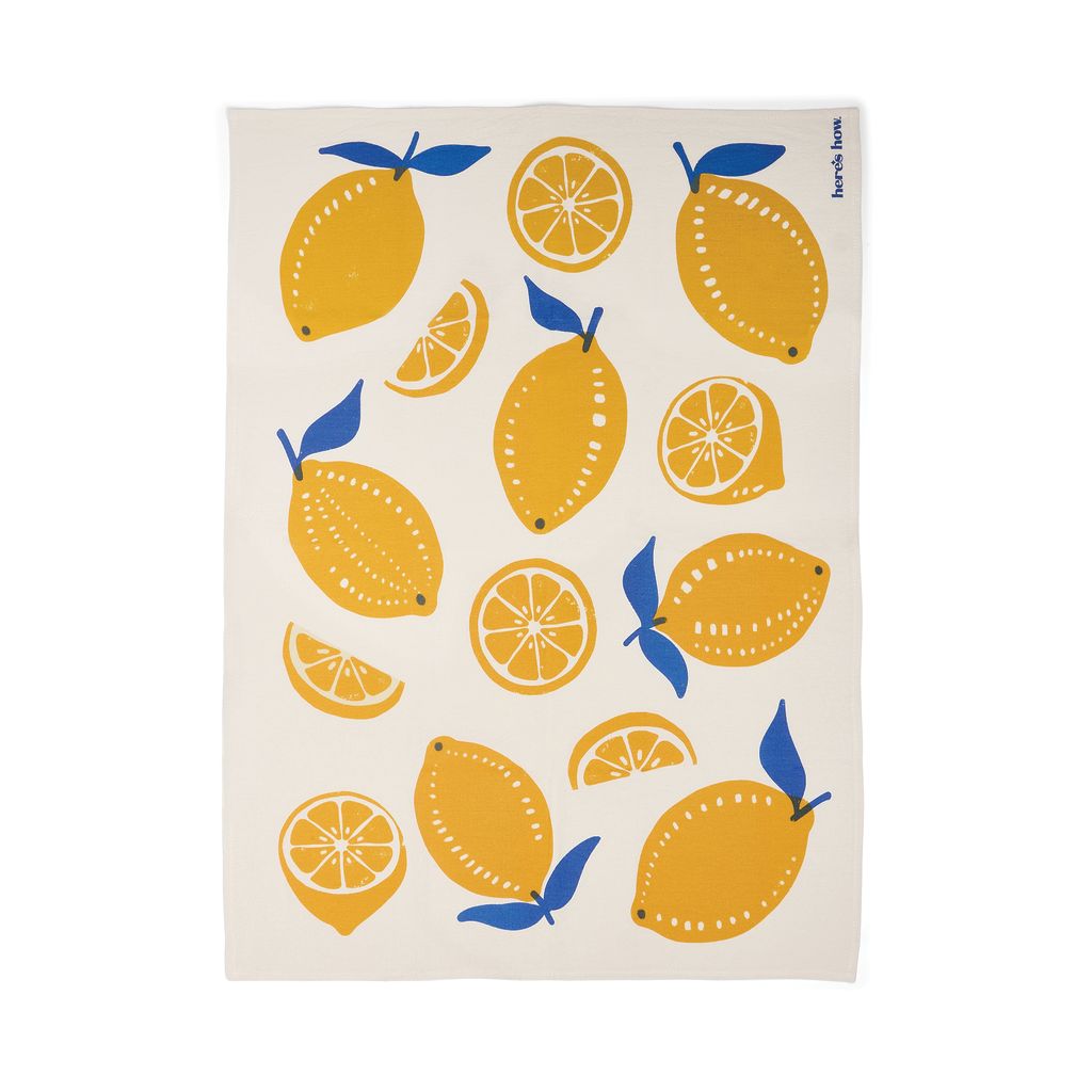 Towel with yellow lemon pattern on a white background
