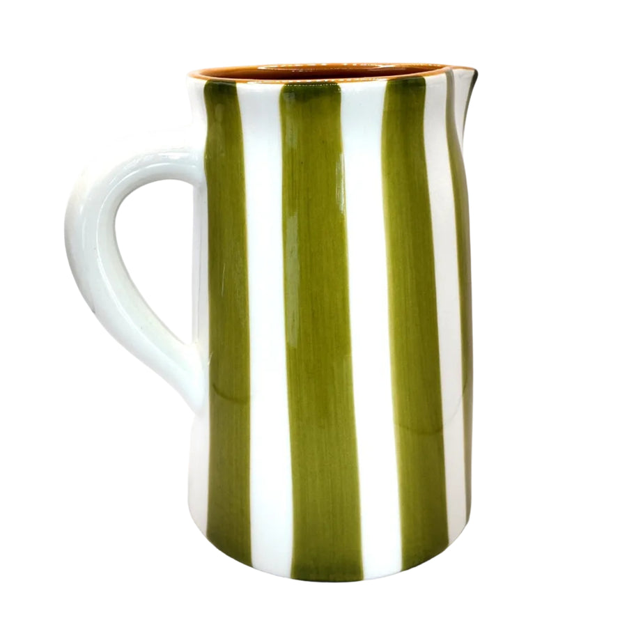 Ceramic pitcher with green and white stripes on a white background