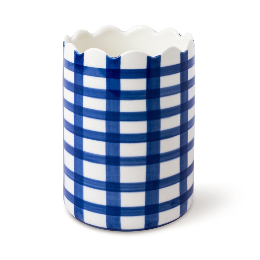 Ceramic vase with blue and white checkered pattern on a white background