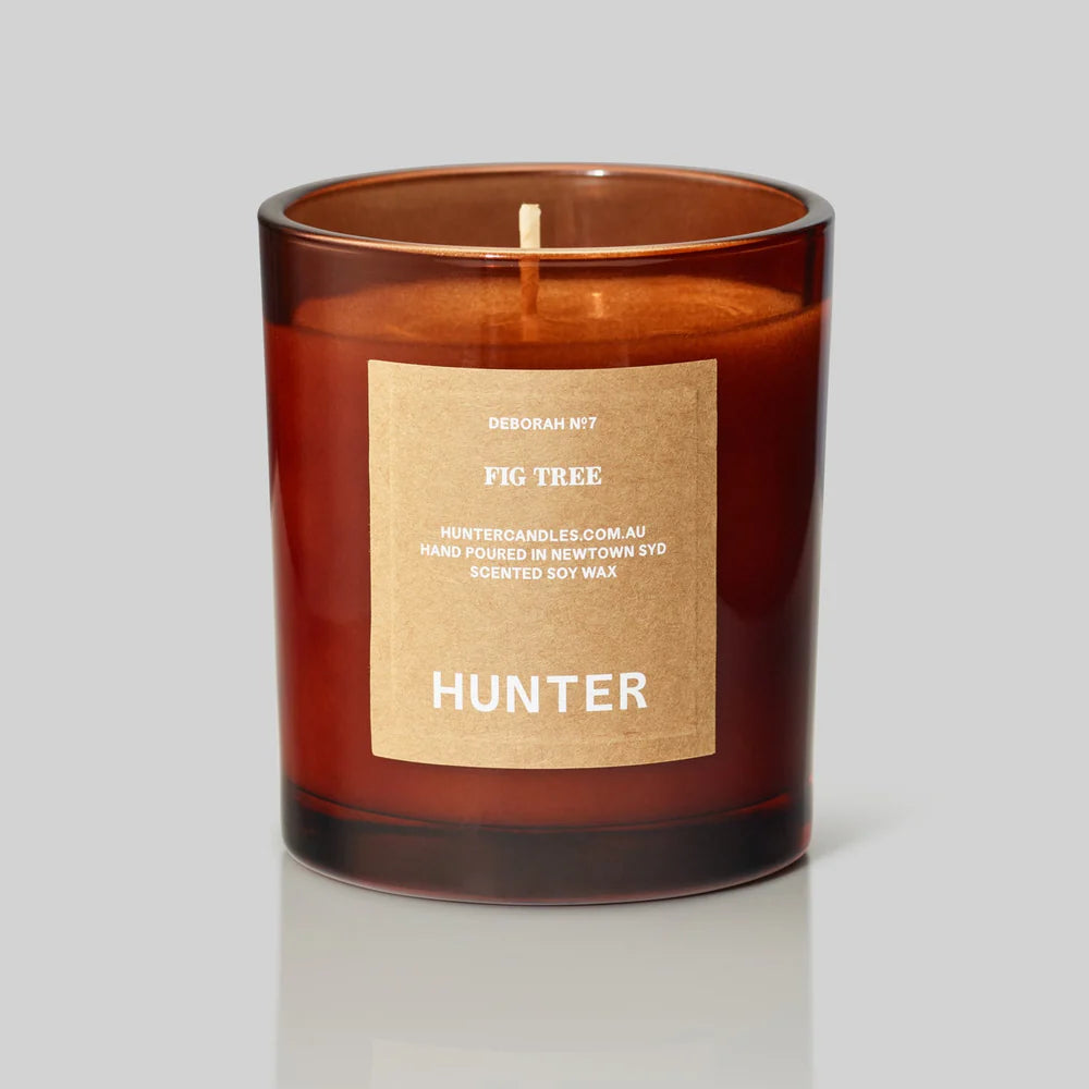 Hunter candle with a label on a gray background