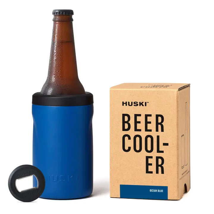 Blue beer cooler with bottle and Huski branded box on a white background
