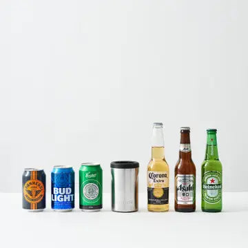 Collection of various beer bottles and cans on a white background