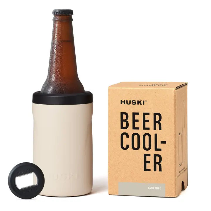 Huski beer cooler with bottle and box on a white background