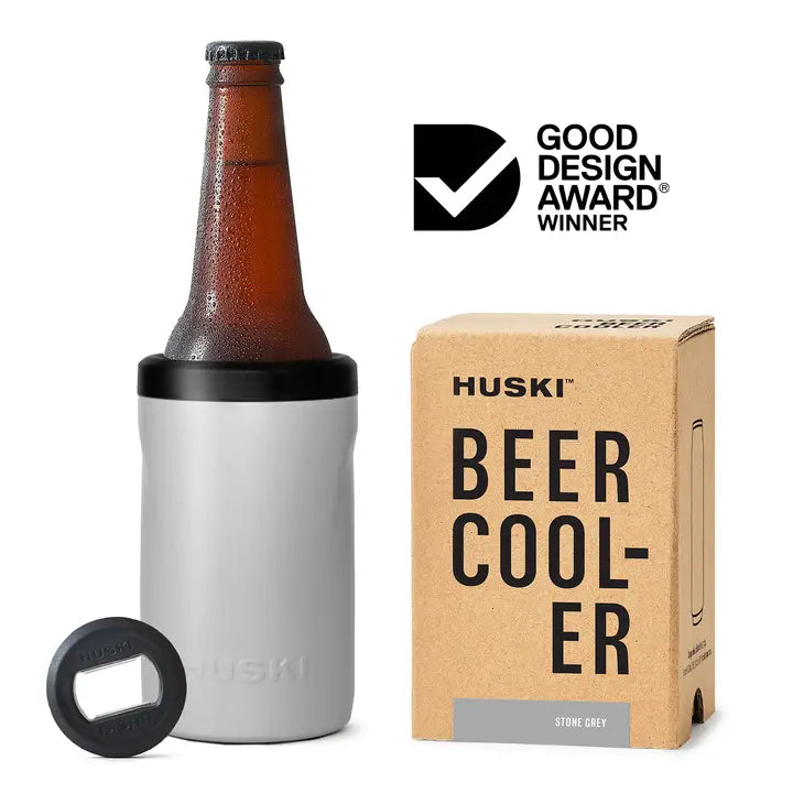 Huski beer cooler with bottle, box, and bottle opener on a white background