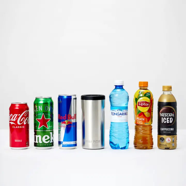 Collection of various drinks including Coca-Cola, Heineken, Red Bull, Nestea, Tongariro, Lipton, and Nescafe on a white background.