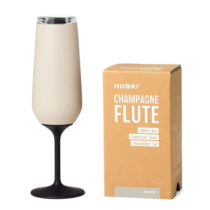 Huski champagne flute in sand beige with box on white background