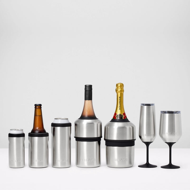 Collection of insulated wine coolers and glasses on a white background
