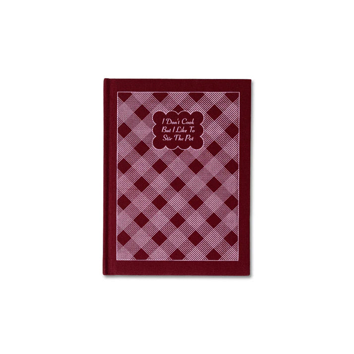 A burgundy and pink notepad on a white background