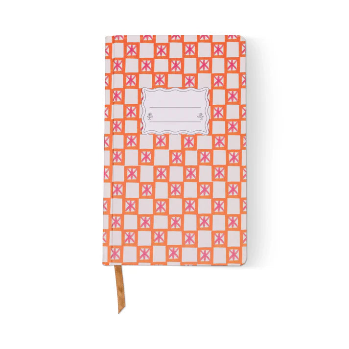 Front of a Designworks journal with pink &amp; orange pattern on it