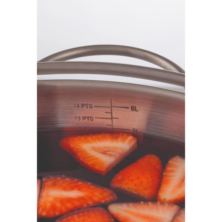 Strawberries being cooked in a pot with a thermometer showing temperature.