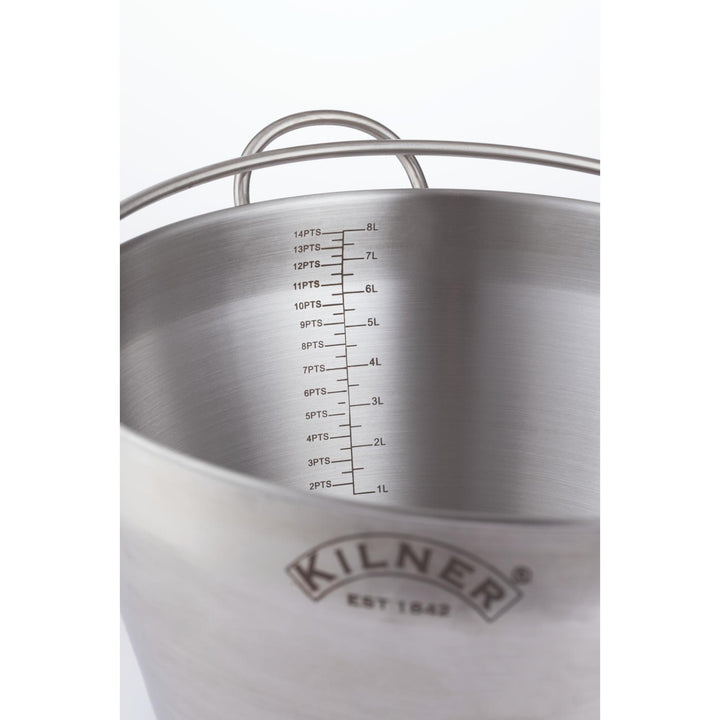 Stainless steel measuring jug with Kilner logo on a white background