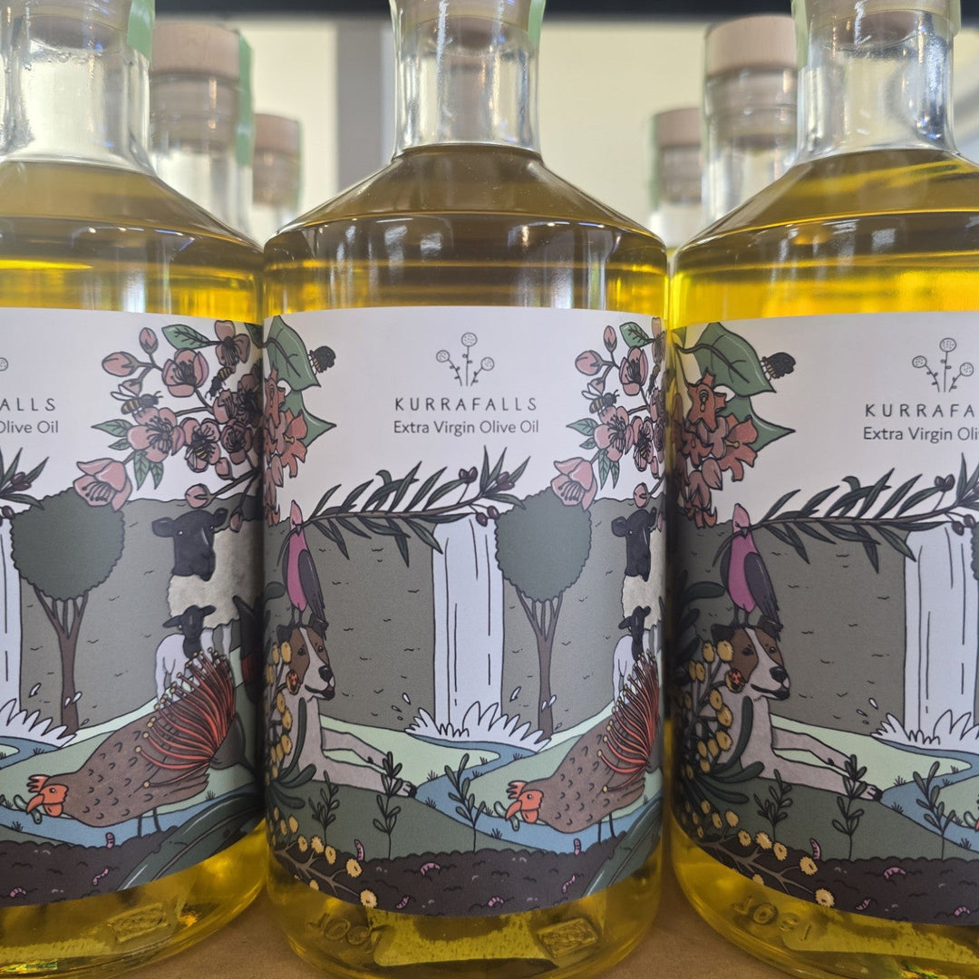 Bottles of Kurrafalls extra virgin olive oil on a shelf