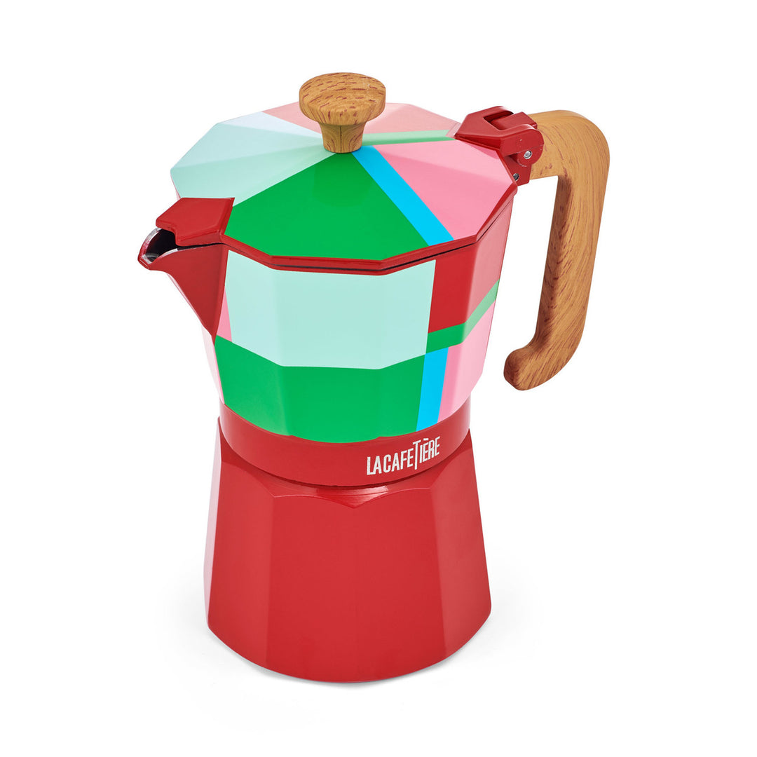 Colorful coffee maker with geometric design on a white background