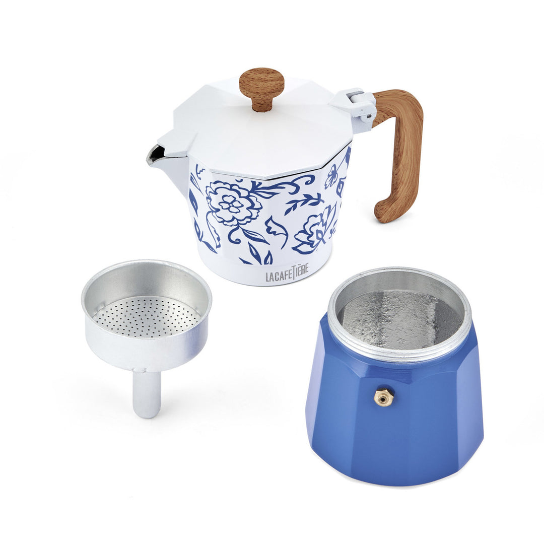Blue and white coffee maker with wooden handle and two additional components on a white background